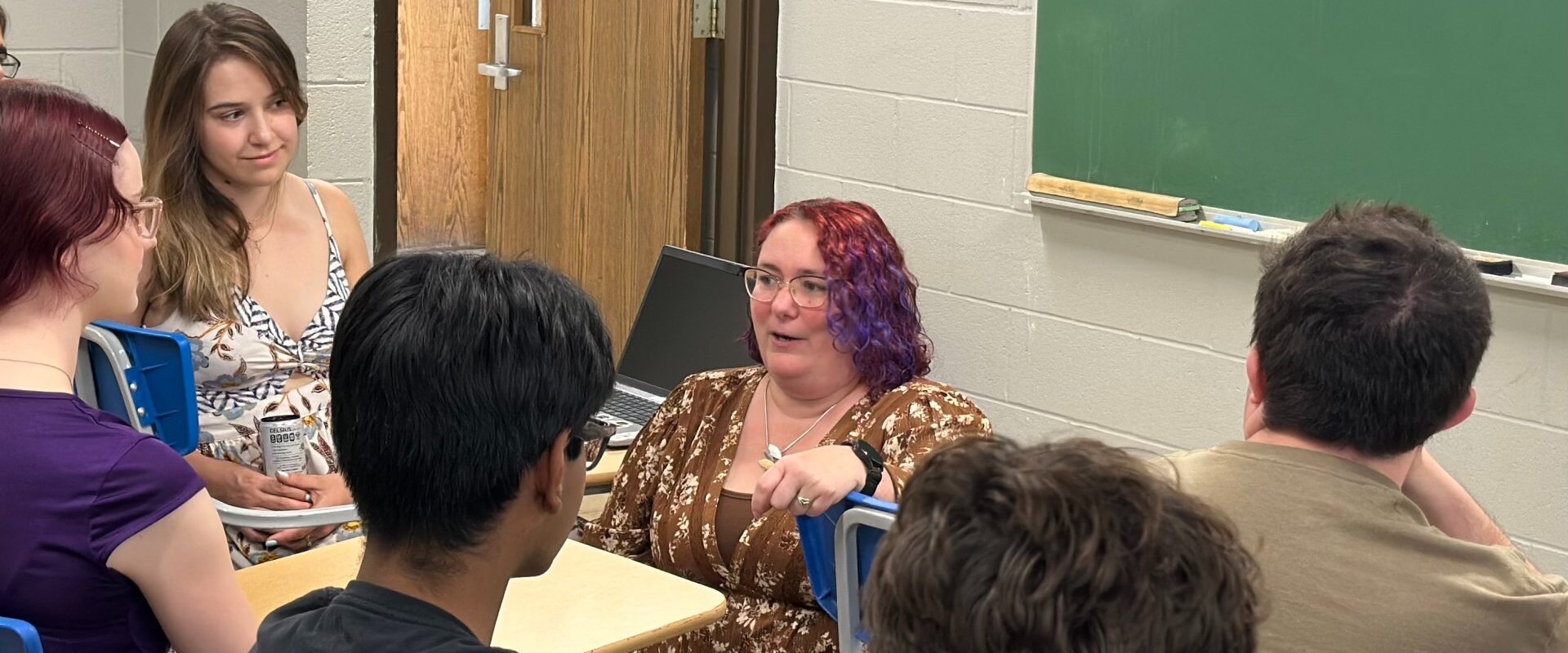 Professor Lisa Pavia-Higel talking during an activity with her students